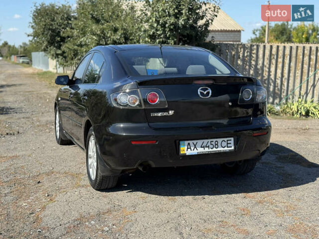 Чорний Мазда 3, об'ємом двигуна 1.6 л та пробігом 160 тис. км за 5999 $, фото 3 на Automoto.ua