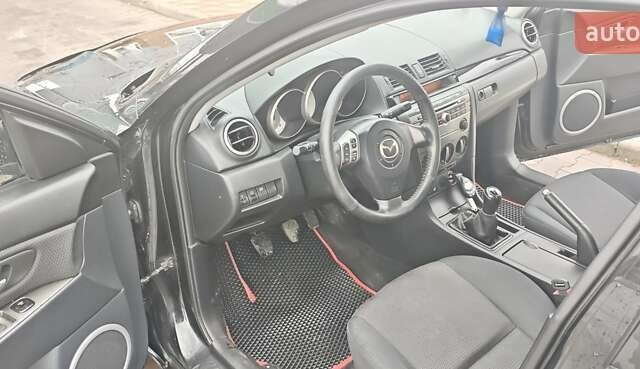 Черный Мазда 3, объемом двигателя 1.6 л и пробегом 205 тыс. км за 5600 $, фото 2 на Automoto.ua