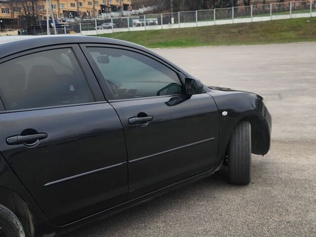 Черный Мазда 3, объемом двигателя 1.6 л и пробегом 300 тыс. км за 3700 $, фото 4 на Automoto.ua