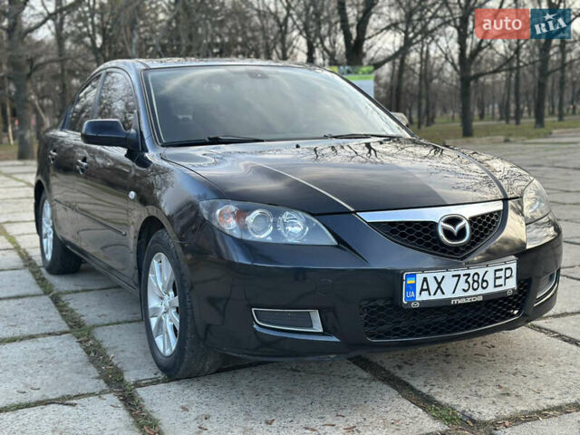 Чорний Мазда 3, об'ємом двигуна 1.6 л та пробігом 198 тис. км за 5499 $, фото 6 на Automoto.ua