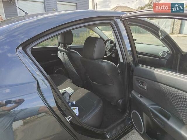 Чорний Мазда 3, об'ємом двигуна 1.6 л та пробігом 208 тис. км за 5500 $, фото 3 на Automoto.ua