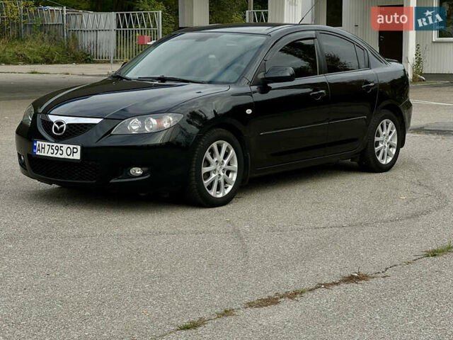 Черный Мазда 3, объемом двигателя 1.6 л и пробегом 158 тыс. км за 6200 $, фото 1 на Automoto.ua