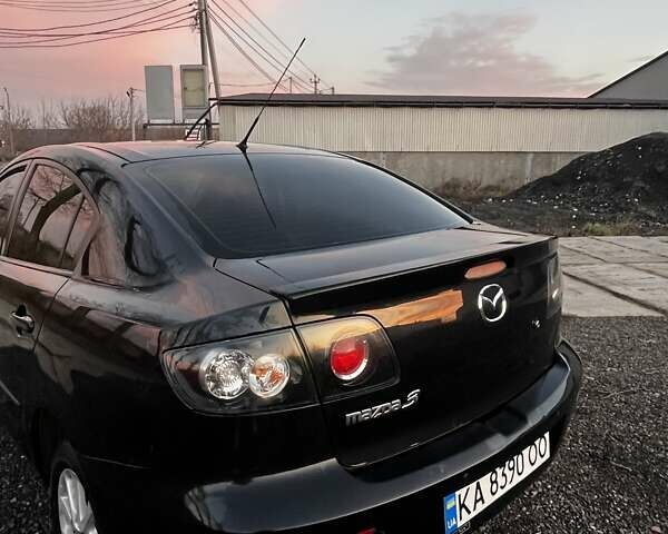 Черный Мазда 3, объемом двигателя 1.6 л и пробегом 153 тыс. км за 6200 $, фото 1 на Automoto.ua
