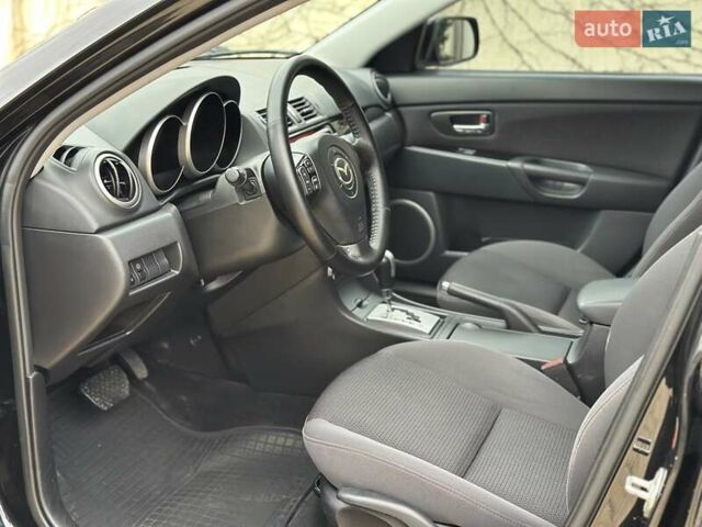 Черный Мазда 3, объемом двигателя 1.6 л и пробегом 130 тыс. км за 7700 $, фото 34 на Automoto.ua