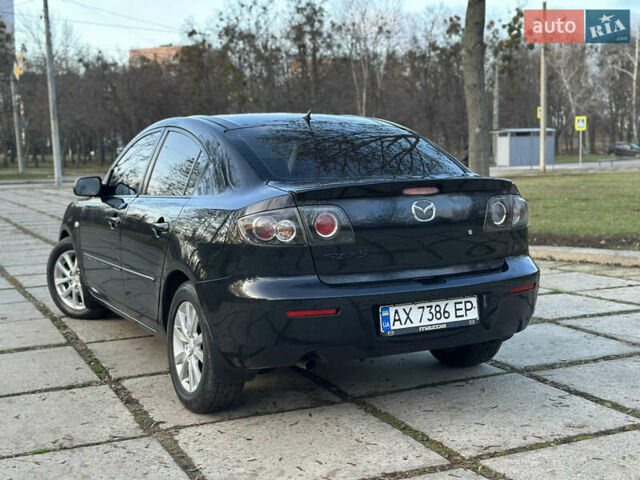 Чорний Мазда 3, об'ємом двигуна 1.6 л та пробігом 198 тис. км за 5499 $, фото 19 на Automoto.ua