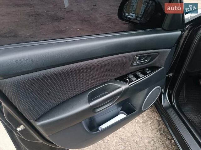 Черный Мазда 3, объемом двигателя 2 л и пробегом 221 тыс. км за 5700 $, фото 22 на Automoto.ua