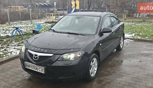 Черный Мазда 3, объемом двигателя 1.6 л и пробегом 205 тыс. км за 5600 $, фото 4 на Automoto.ua