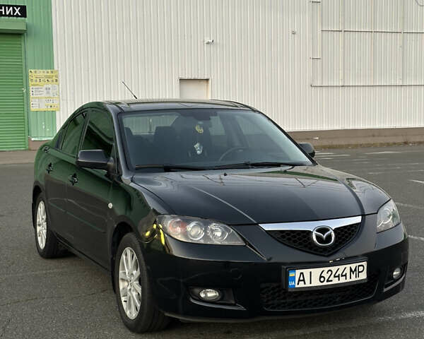 Черный Мазда 3, объемом двигателя 1.6 л и пробегом 225 тыс. км за 5900 $, фото 2 на Automoto.ua