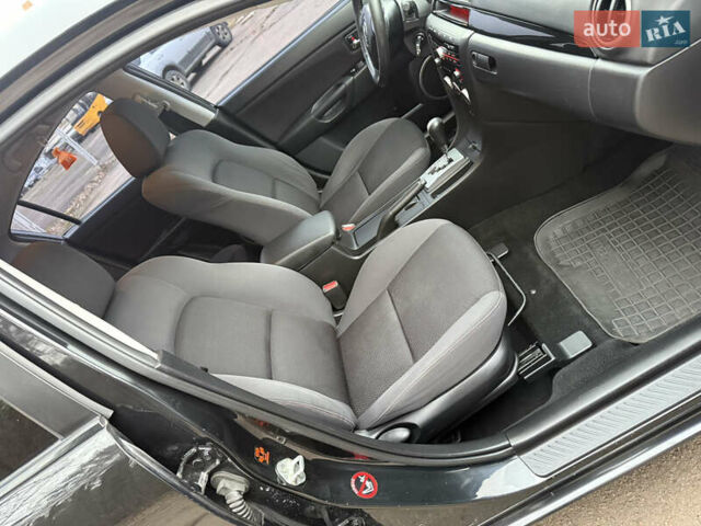 Чорний Мазда 3, об'ємом двигуна 1.6 л та пробігом 183 тис. км за 6150 $, фото 43 на Automoto.ua