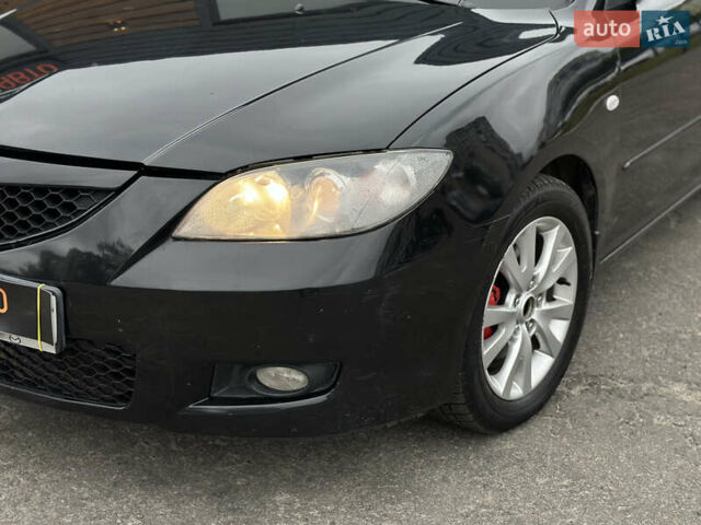 Чорний Мазда 3, об'ємом двигуна 1.6 л та пробігом 223 тис. км за 5450 $, фото 4 на Automoto.ua