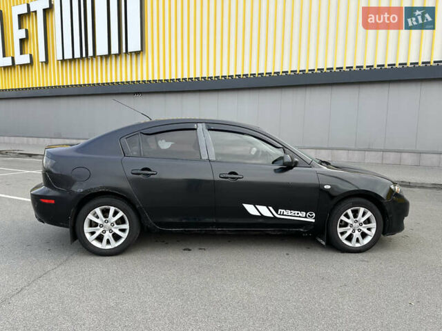Черный Мазда 3, объемом двигателя 2 л и пробегом 200 тыс. км за 2700 $, фото 4 на Automoto.ua