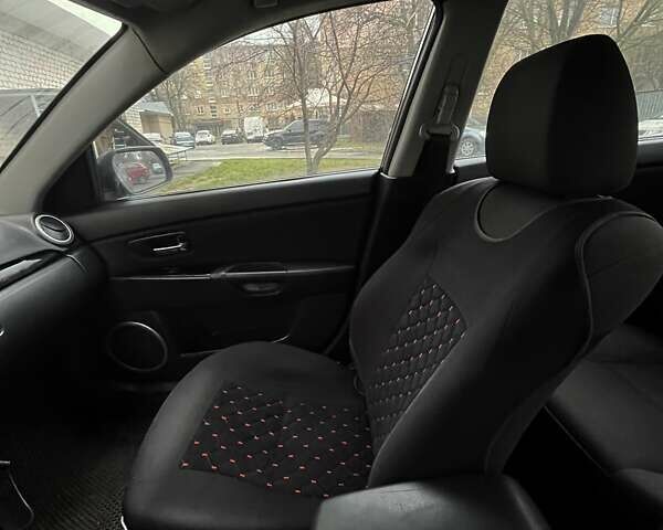 Черный Мазда 3, объемом двигателя 1.6 л и пробегом 153 тыс. км за 6200 $, фото 22 на Automoto.ua