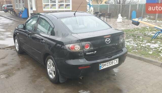 Черный Мазда 3, объемом двигателя 1.6 л и пробегом 205 тыс. км за 5600 $, фото 6 на Automoto.ua