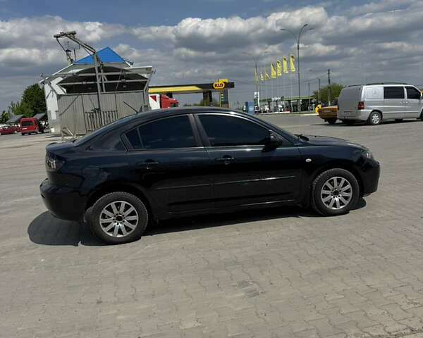 Черный Мазда 3, объемом двигателя 1.6 л и пробегом 268 тыс. км за 5100 $, фото 4 на Automoto.ua