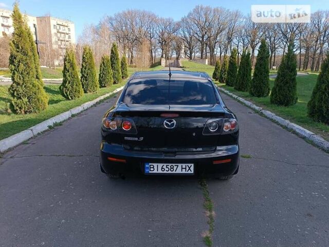 Чорний Мазда 3, об'ємом двигуна 1.6 л та пробігом 142 тис. км за 5850 $, фото 7 на Automoto.ua