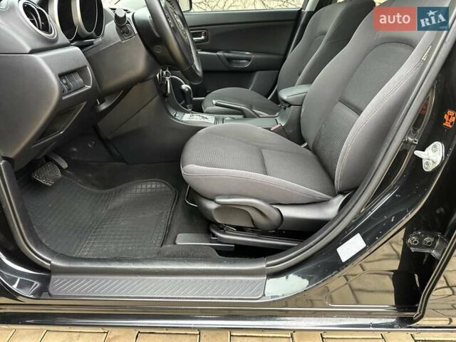 Черный Мазда 3, объемом двигателя 1.6 л и пробегом 130 тыс. км за 7700 $, фото 56 на Automoto.ua