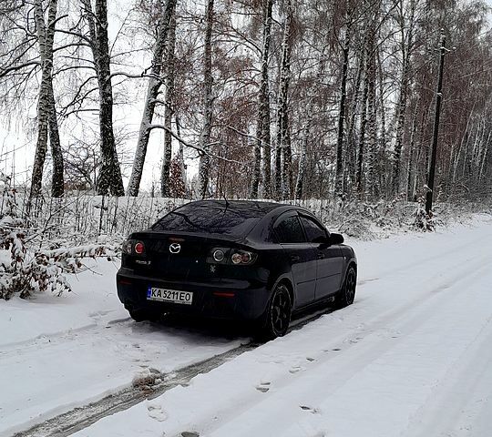 Черный Мазда 3, объемом двигателя 1.6 л и пробегом 205 тыс. км за 5600 $, фото 1 на Automoto.ua