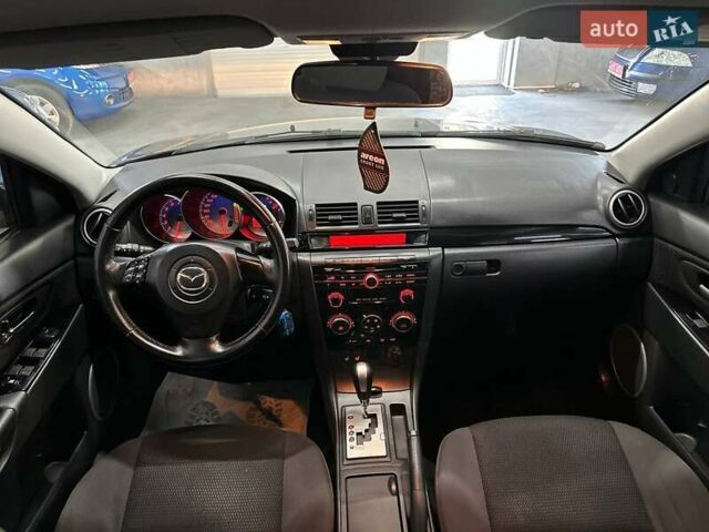 Чорний Мазда 3, об'ємом двигуна 2 л та пробігом 199 тис. км за 7299 $, фото 18 на Automoto.ua