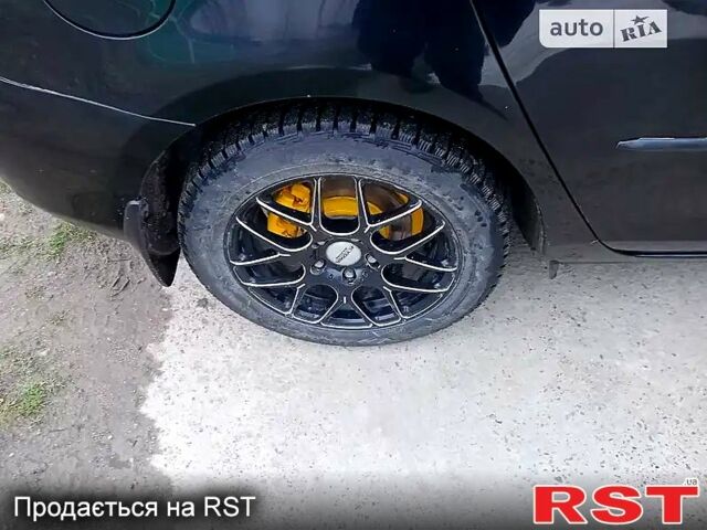 Чорний Мазда 3, об'ємом двигуна 1.6 л та пробігом 138 тис. км за 5500 $, фото 3 на Automoto.ua