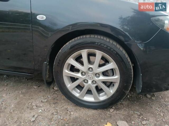Черный Мазда 3, объемом двигателя 2 л и пробегом 221 тыс. км за 5700 $, фото 15 на Automoto.ua