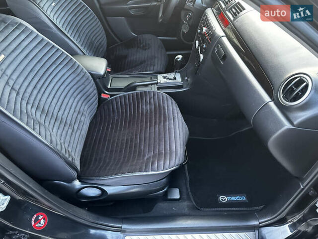 Чорний Мазда 3, об'ємом двигуна 1.6 л та пробігом 198 тис. км за 5499 $, фото 45 на Automoto.ua
