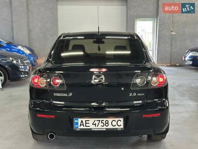 Чорний Мазда 3, об'ємом двигуна 2 л та пробігом 199 тис. км за 7299 $, фото 5 на Automoto.ua