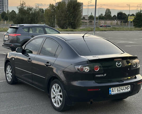 Черный Мазда 3, объемом двигателя 1.6 л и пробегом 225 тыс. км за 5900 $, фото 5 на Automoto.ua