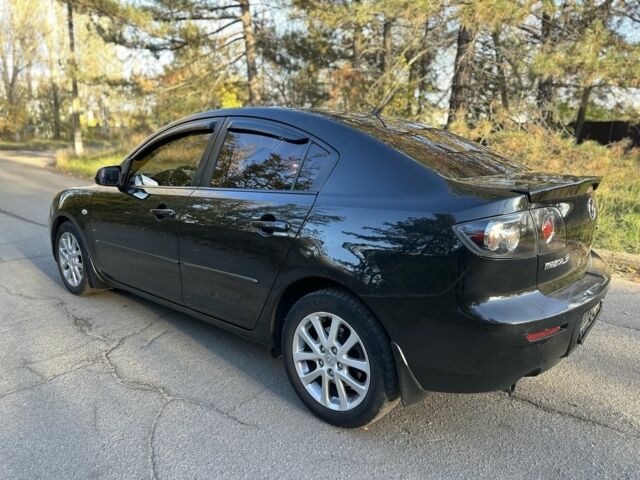 Черный Мазда 3, объемом двигателя 2 л и пробегом 192 тыс. км за 6500 $, фото 1 на Automoto.ua