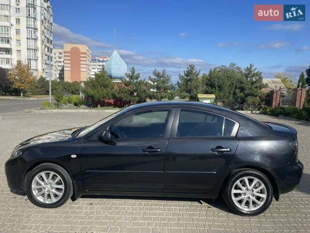 Черный Мазда 3, объемом двигателя 2 л и пробегом 175 тыс. км за 6000 $, фото 3 на Automoto.ua