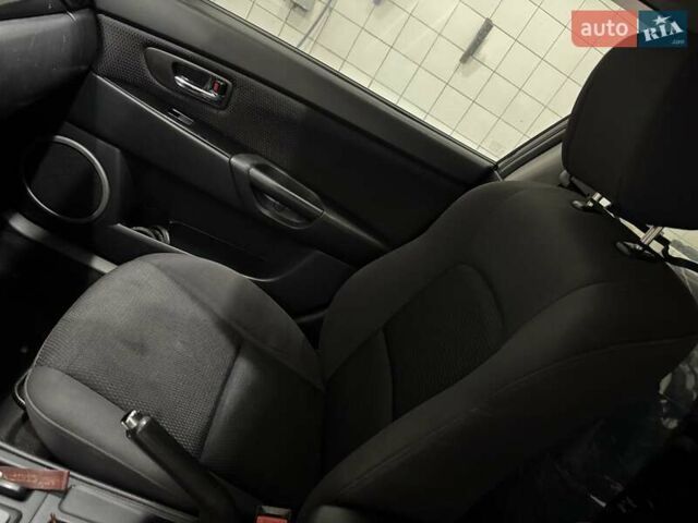Черный Мазда 3, объемом двигателя 1.6 л и пробегом 222 тыс. км за 5450 $, фото 17 на Automoto.ua