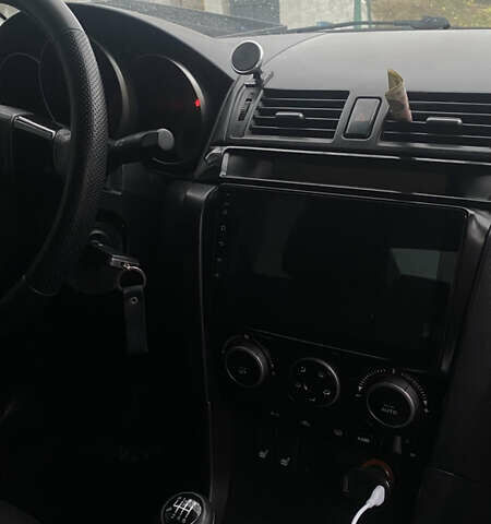 Черный Мазда 3, объемом двигателя 2 л и пробегом 182 тыс. км за 5500 $, фото 9 на Automoto.ua