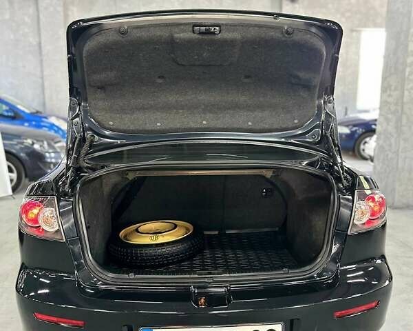 Чорний Мазда 3, об'ємом двигуна 2 л та пробігом 199 тис. км за 7299 $, фото 19 на Automoto.ua