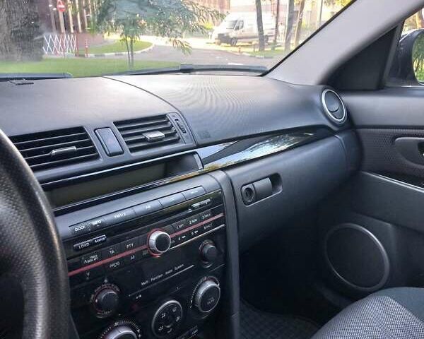 Черный Мазда 3, объемом двигателя 1.6 л и пробегом 121 тыс. км за 6000 $, фото 7 на Automoto.ua