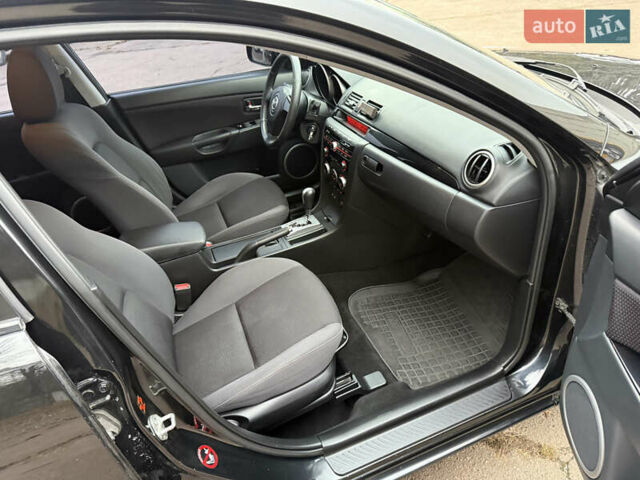 Чорний Мазда 3, об'ємом двигуна 1.6 л та пробігом 183 тис. км за 6150 $, фото 42 на Automoto.ua