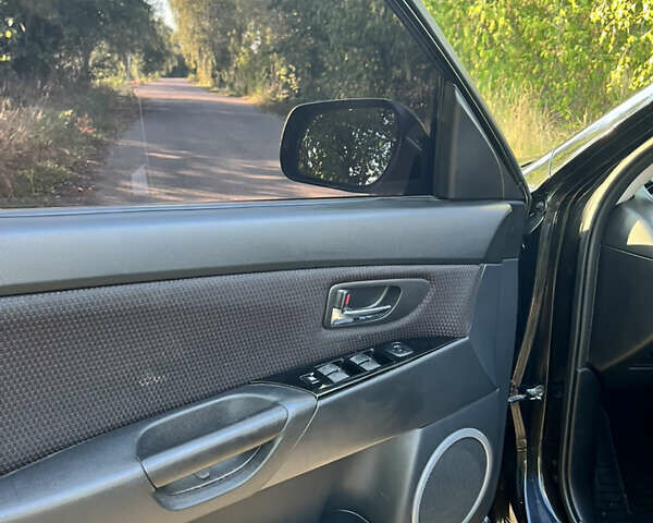 Чорний Мазда 3, об'ємом двигуна 2 л та пробігом 220 тис. км за 5500 $, фото 13 на Automoto.ua