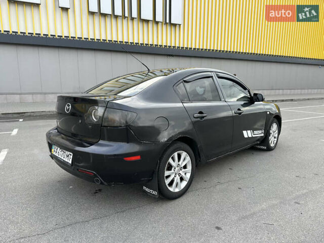 Черный Мазда 3, объемом двигателя 2 л и пробегом 200 тыс. км за 2700 $, фото 3 на Automoto.ua