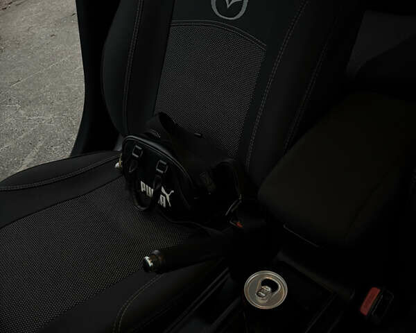 Чорний Мазда 3, об'ємом двигуна 1.6 л та пробігом 330 тис. км за 5500 $, фото 17 на Automoto.ua