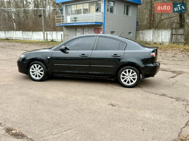 Чорний Мазда 3, об'ємом двигуна 1.6 л та пробігом 183 тис. км за 6150 $, фото 7 на Automoto.ua