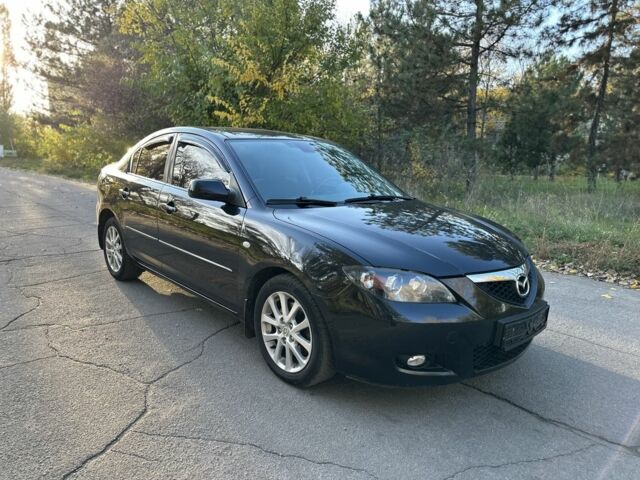 Черный Мазда 3, объемом двигателя 2 л и пробегом 192 тыс. км за 6500 $, фото 5 на Automoto.ua