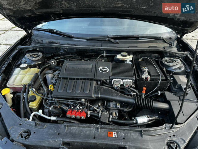 Чорний Мазда 3, об'ємом двигуна 1.6 л та пробігом 198 тис. км за 5499 $, фото 52 на Automoto.ua