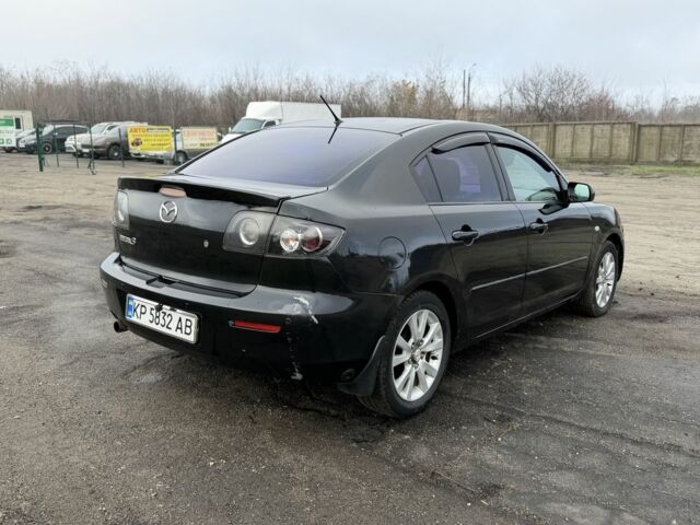 Черный Мазда 3, объемом двигателя 1.6 л и пробегом 225 тыс. км за 4250 $, фото 2 на Automoto.ua