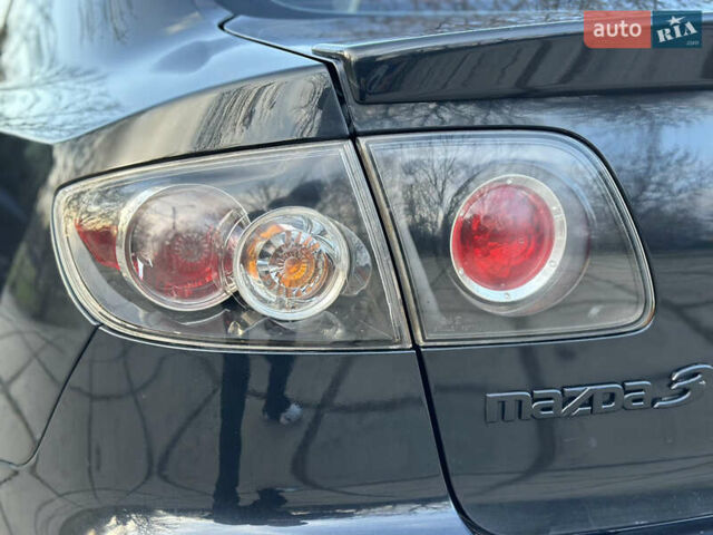 Чорний Мазда 3, об'ємом двигуна 1.6 л та пробігом 198 тис. км за 5499 $, фото 22 на Automoto.ua
