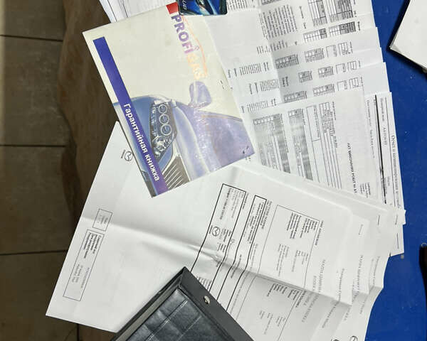 Чорний Мазда 3, об'ємом двигуна 2 л та пробігом 167 тис. км за 7500 $, фото 22 на Automoto.ua