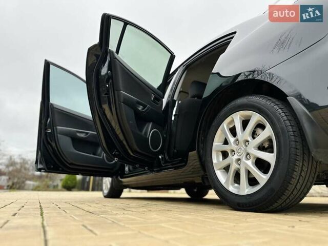 Черный Мазда 3, объемом двигателя 1.6 л и пробегом 130 тыс. км за 7700 $, фото 52 на Automoto.ua