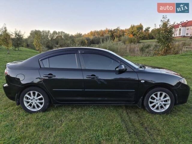 Чорний Мазда 3, об'ємом двигуна 1.6 л та пробігом 253 тис. км за 5200 $, фото 6 на Automoto.ua