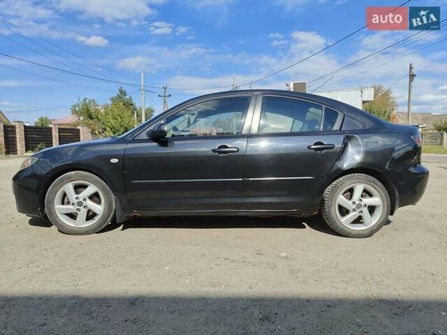 Чорний Мазда 3, об'ємом двигуна 1.6 л та пробігом 208 тис. км за 5500 $, фото 4 на Automoto.ua