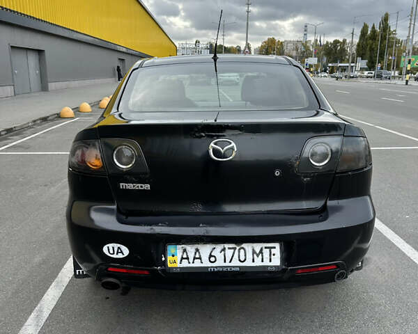 Черный Мазда 3, объемом двигателя 2 л и пробегом 200 тыс. км за 2700 $, фото 7 на Automoto.ua