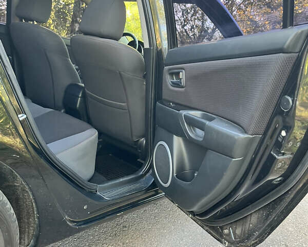 Чорний Мазда 3, об'ємом двигуна 2 л та пробігом 220 тис. км за 5500 $, фото 11 на Automoto.ua