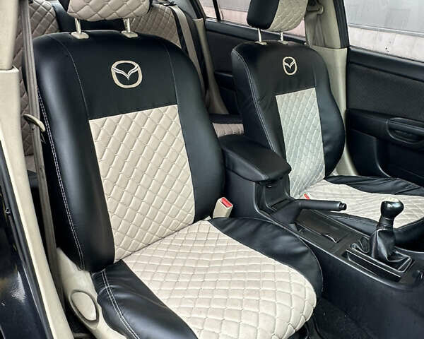 Черный Мазда 3, объемом двигателя 2 л и пробегом 200 тыс. км за 2700 $, фото 18 на Automoto.ua