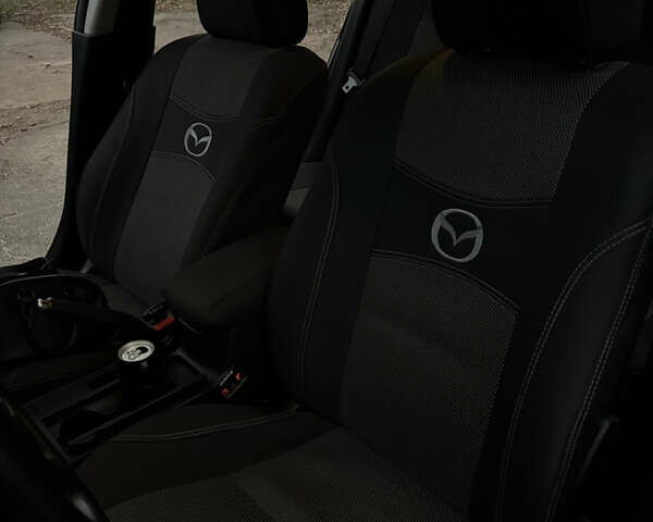 Чорний Мазда 3, об'ємом двигуна 1.6 л та пробігом 330 тис. км за 5500 $, фото 16 на Automoto.ua